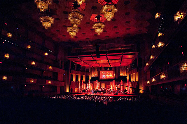 Orchestra Members Are Staged Under the Multi-Media Screen