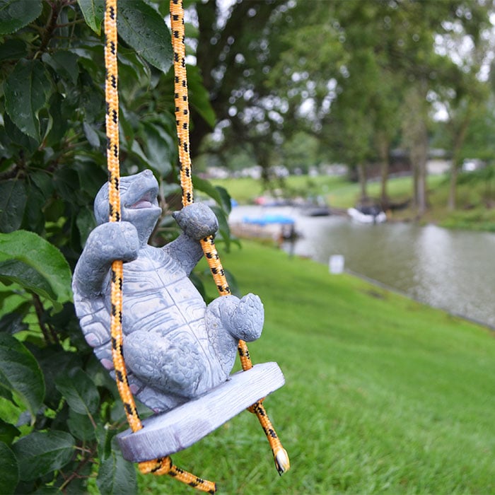 turtle sculpture hangs from a tree near Indian Lake in Silver Creek, Michigan