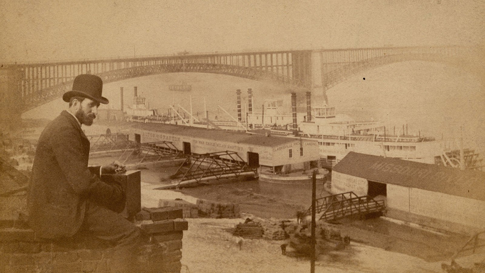 River traffic at the Eads Bridge, with Professor William Butler in the foreground