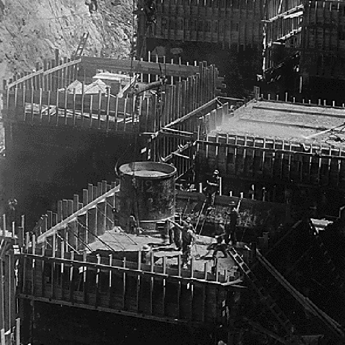 Placing concrete in panel or column forms near downstream toe in Boulder Dam foundation
