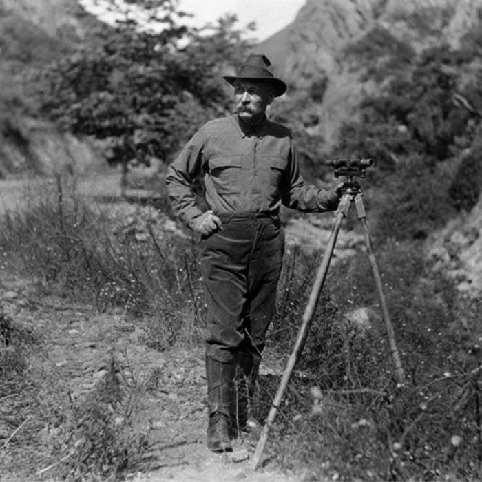 William Mulholland in the field with his surveying instrument