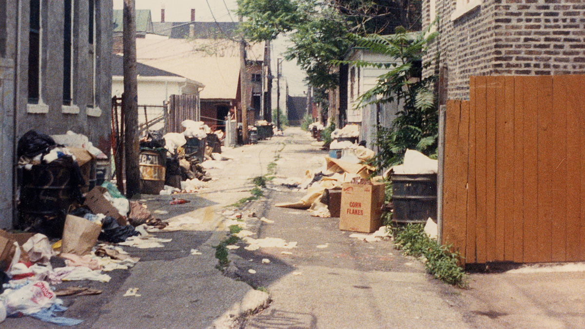 Garbage piled in the alleyways.