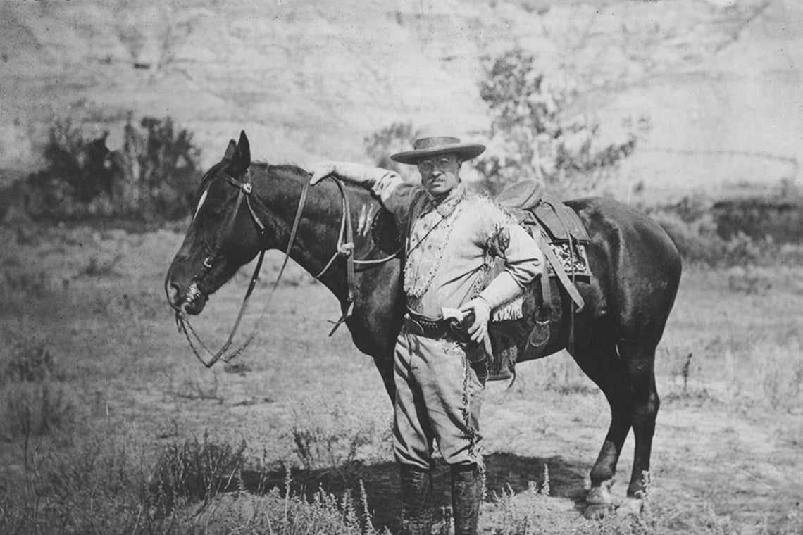 A Native American hunting a Buffalo on horseback