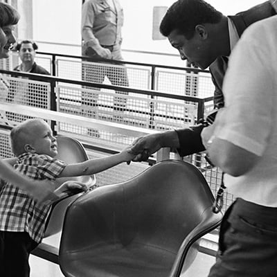Muhammad Ali meets fans as he arrives at O'Hare Airport, Chicago, Illinois on June 21, 1967. Photo: ST-50000446-0004, Chicago Sun-Times collection, Chicago History Museum