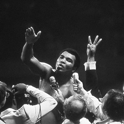 Muhammad Ali talks with the press after winning back the Heavyweight Championship for an unprecedented third time by beating Leon Spinks at the Super Dome in New Orleans, LA. September 15, 1978. Photo: Courtesy of Michael Gaffney