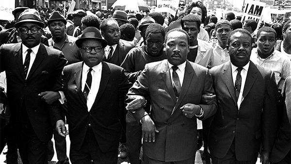Rev. Ralph Abernathy, right, and Bishop Julian Smith, left, flank Dr. Martin Luther King, Jr., during a civil rights march in Memphis, Tenn., March 28, 1968, a few days before King was assassinated. Photo: AP Photo/Jack Thornell