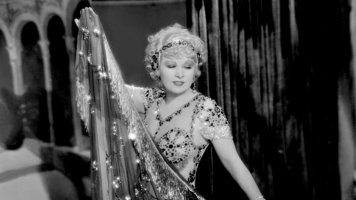 Mae West as Tira does a "muscle dance" in the film I'm No Angel, 1933. Photo: Alamy Stock Photo