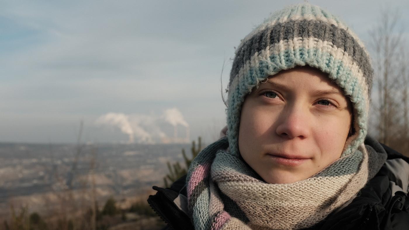 Greta Thunberg beside the Bełchatów coal power station in Poland, the largest single source of carbon dioxide emissions in the European Union. Photo: Jon Sayers/BBC Studios