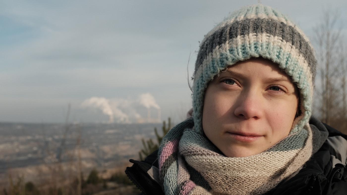 Greta Thunberg beside the Bełchatów coal power station in Poland, the largest single source of carbon dioxide emissions in the European Union.