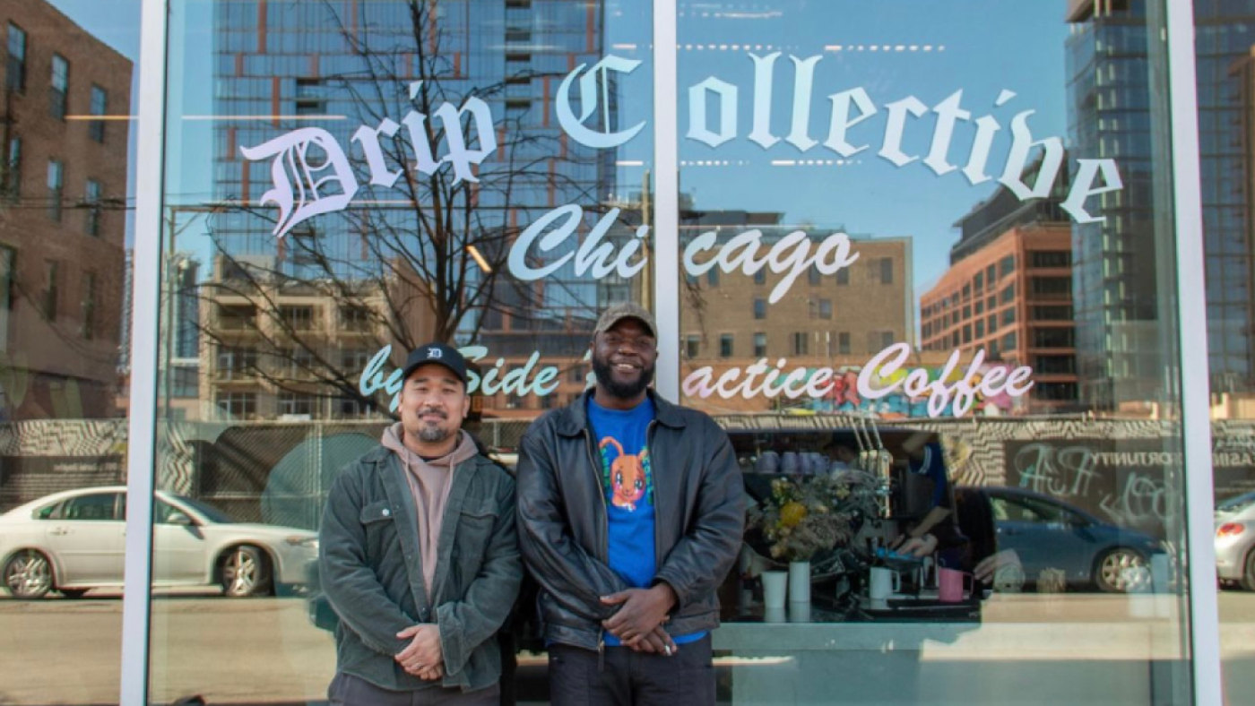 Francis Almeda and Ty Banks stand in front of their cafe, Drip Collective