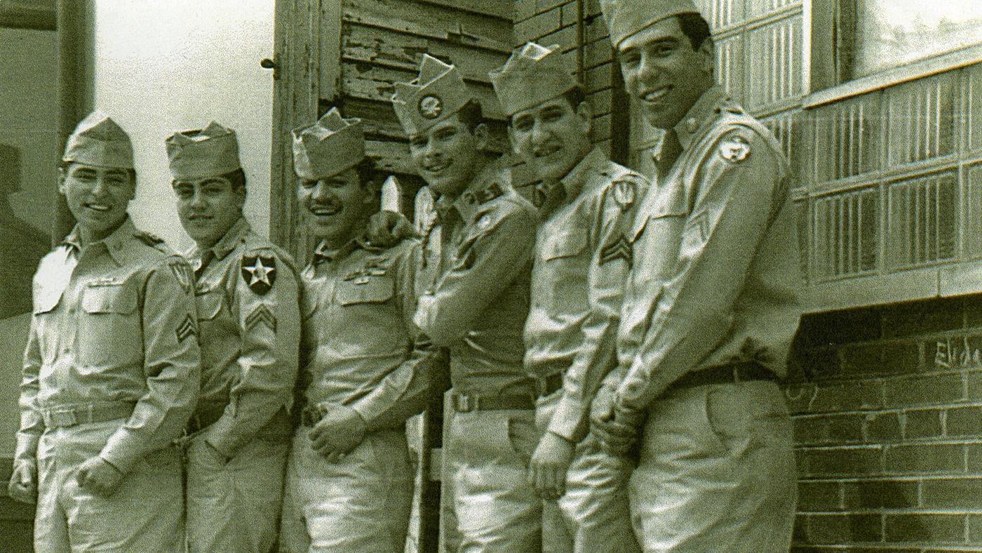 A group of six soldiers from the Korean War posing for a photograph