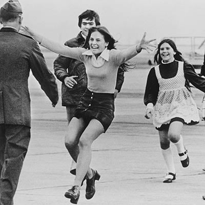 Released POW, Lt. Col. Robert L. Stirm, is greeted by his family. Travis Air Force Base, March 17, 1973. Photo: AP Photo/Sal Veder