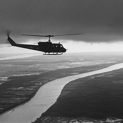 South Vietnamese troops fly over the Mekong Delta. 1963. Photo: Rene Burri/Magnum Photos