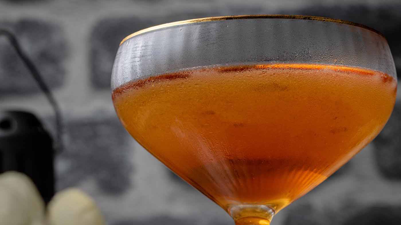 The bijou cocktail in a glass