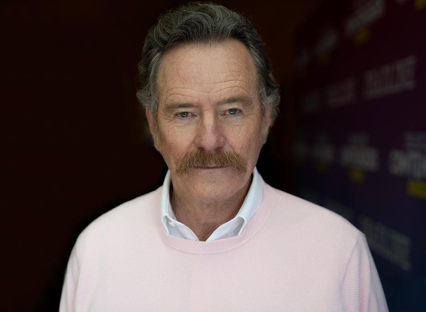 Bryan Cranston with a mustache in a headshot