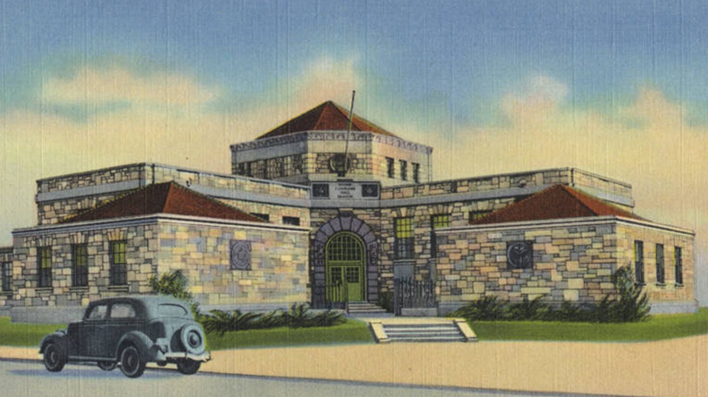An illustration of the George Cleveland Hall Branch of the Chicago Public Library, with an old automobile in front
