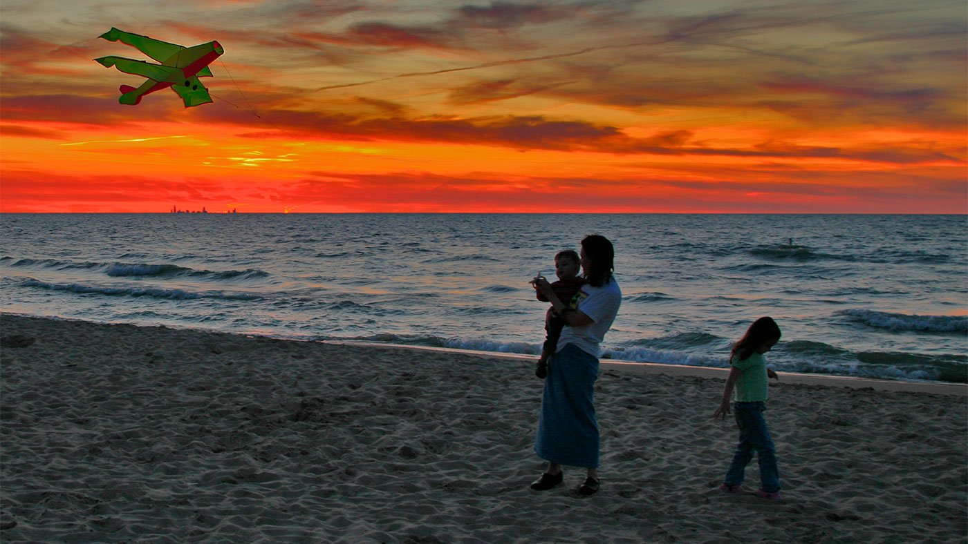 family on beach at Indiana Dunes