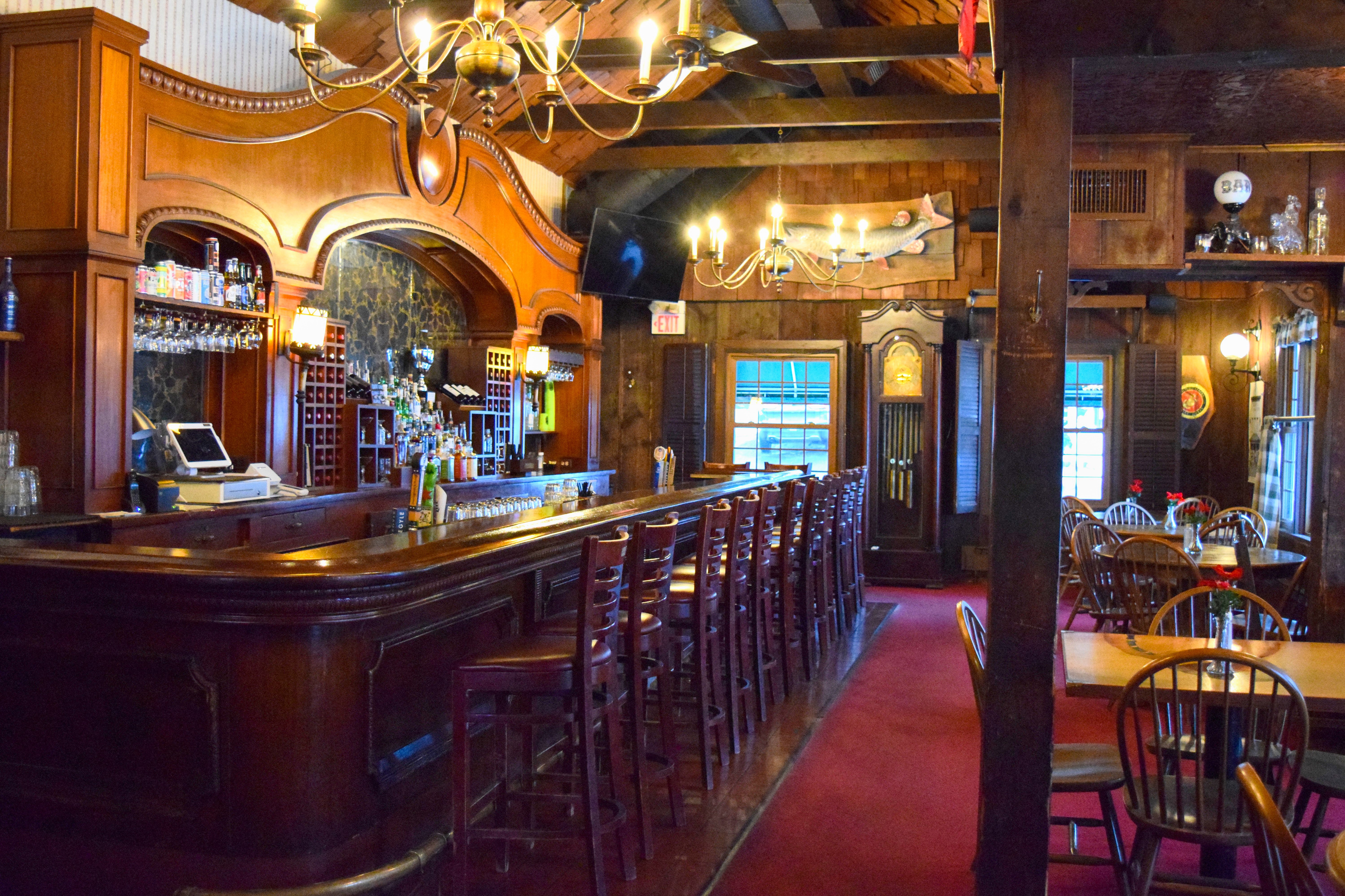 The mahogany bar at The Village Tavern.