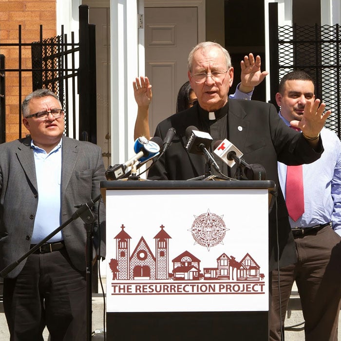 Father Charles blesses homes