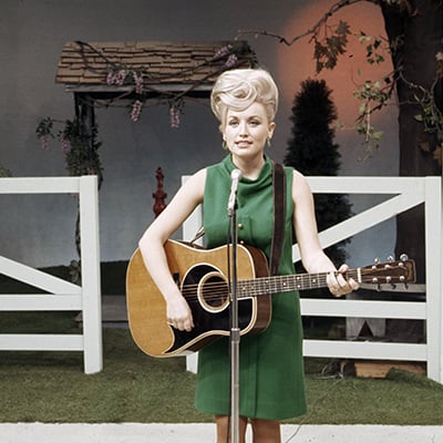 Dolly Parton on the Porter Wagoner Show, 1967. Photo: Courtesy of Les Leverett photograph, Grand Ole Opry Archives
