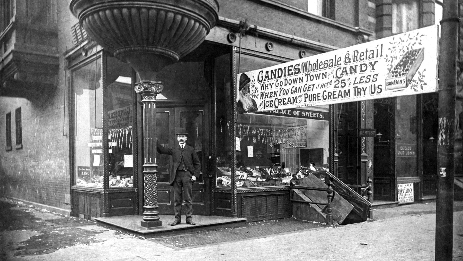 Emil Brach standing outside his Chicago sweet shop