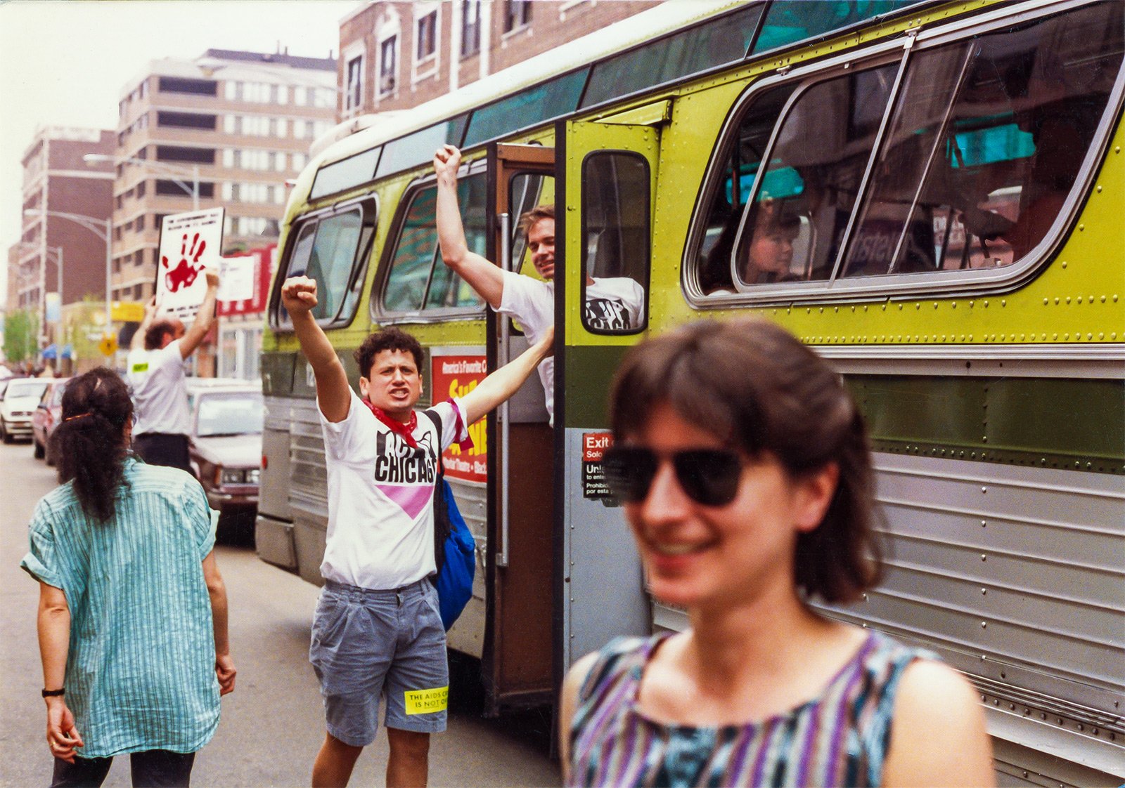 Danny Sotomayor standing next to a bus at the protest