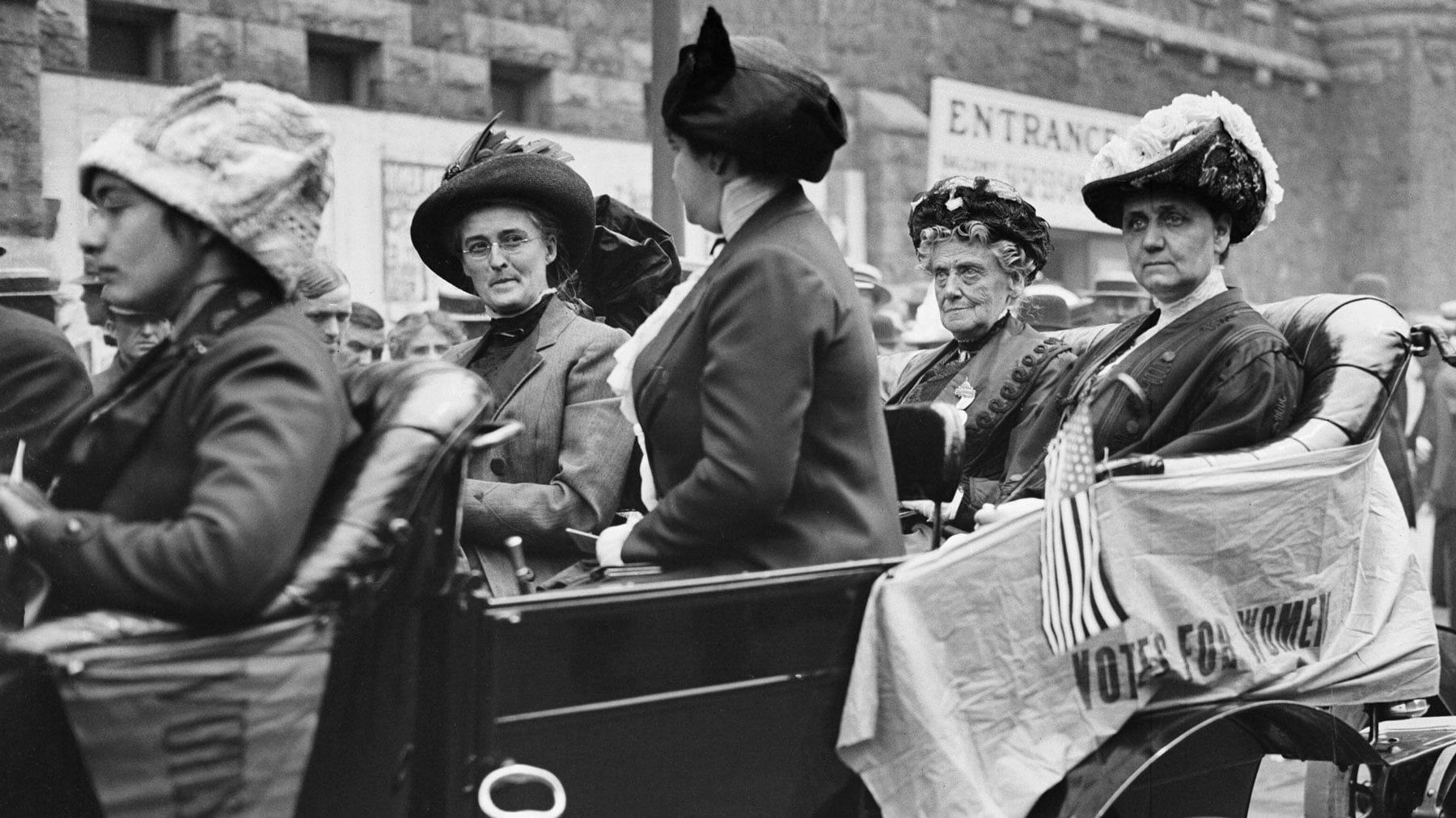 Jane Addams rides in a car in front of the Coliseum during the Republican National Convention of 1912