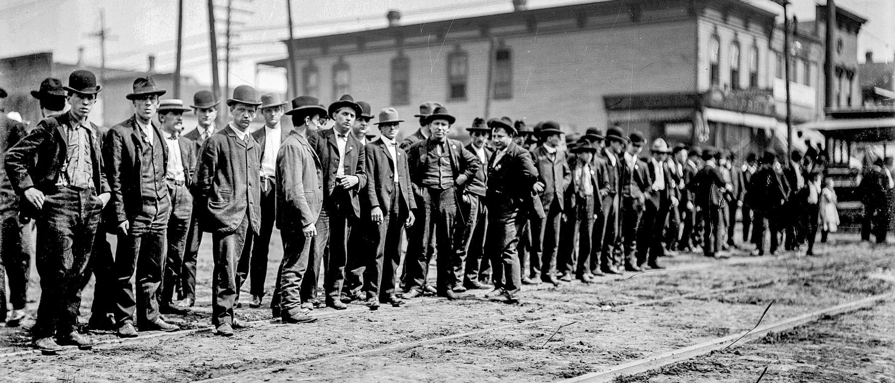 Group of men standing in a line