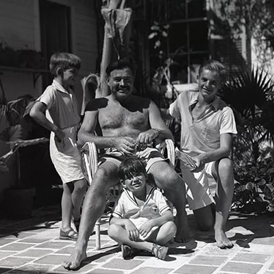 Ernest Hemingway with his three sons, Jack, Patrick, and Gregory at his Key West home. Photo: Courtesy Patrick Hemingway Papers, Manuscripts Division, Department of Special Collections, Princeton University Library