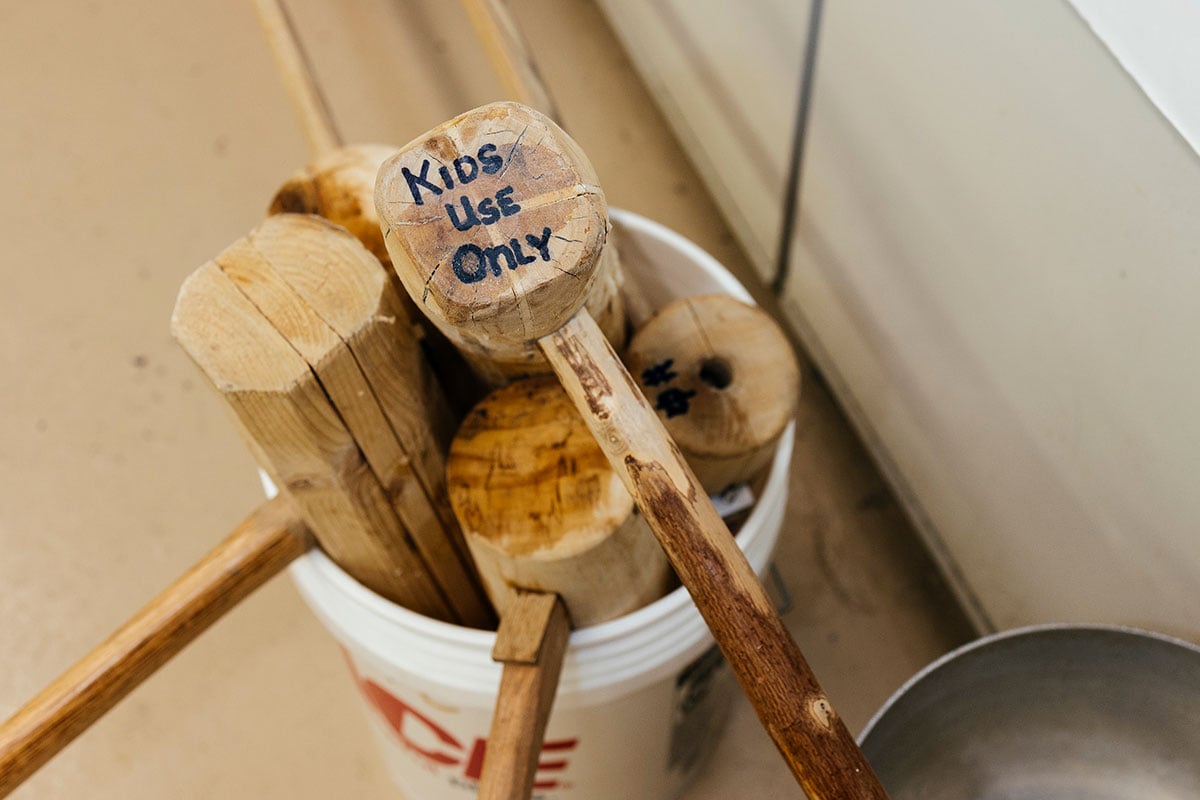Bucket of kine with one marked 'kids use only'