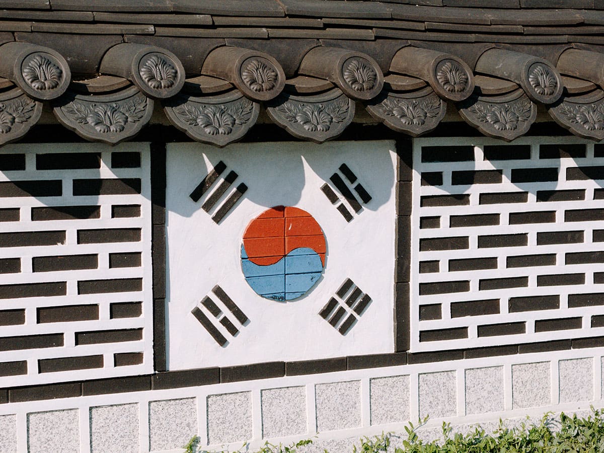 The Korean flag inset into a decorated wall