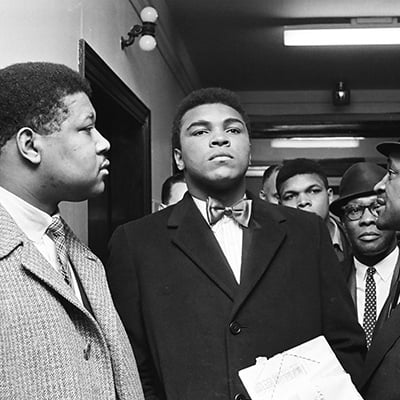 Muhammad Ali at a hearing with the Illinois Athletic Commission on February 25, 1966 over whether to cancel his fight against Ernie Terrell for Ali’s refusal to serve in the military. Photo: ST-50000293-0007, Chicago Sun-Times collection, Chicago History Museum