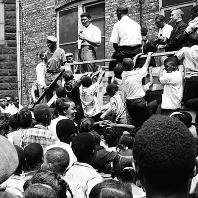 Muhammad Ali visits kids at the Saint Agatha Church, 3147 West Douglas Boulevard, Chicago, Illinois on July 1, 1966. Photo: ST-50000292-0009, Chicago Sun-Times collection, Chicago History Museum