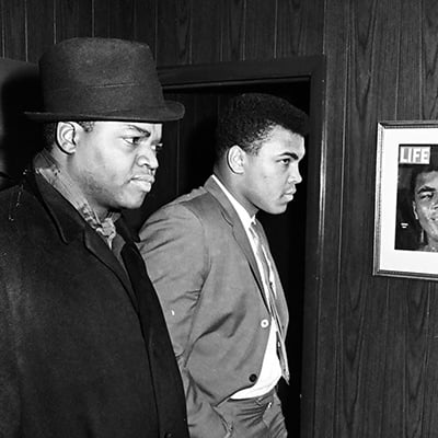 Muhammad Ali speaks with a Daily News reporter on February 22, 1965 about a fire at his apartment in Chicago, Illinois a few days earlier. Photo: ST-50000286-0005, Chicago Sun-Times collection, Chicago History Museum