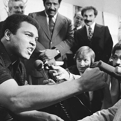 Muhammad Ali speaks with Scott Ledoux at a press conference in Chicago, Illinois on October 25, 1977. Photo: ST-19080063-0015, Chicago Sun-Times collection, Chicago History Museum