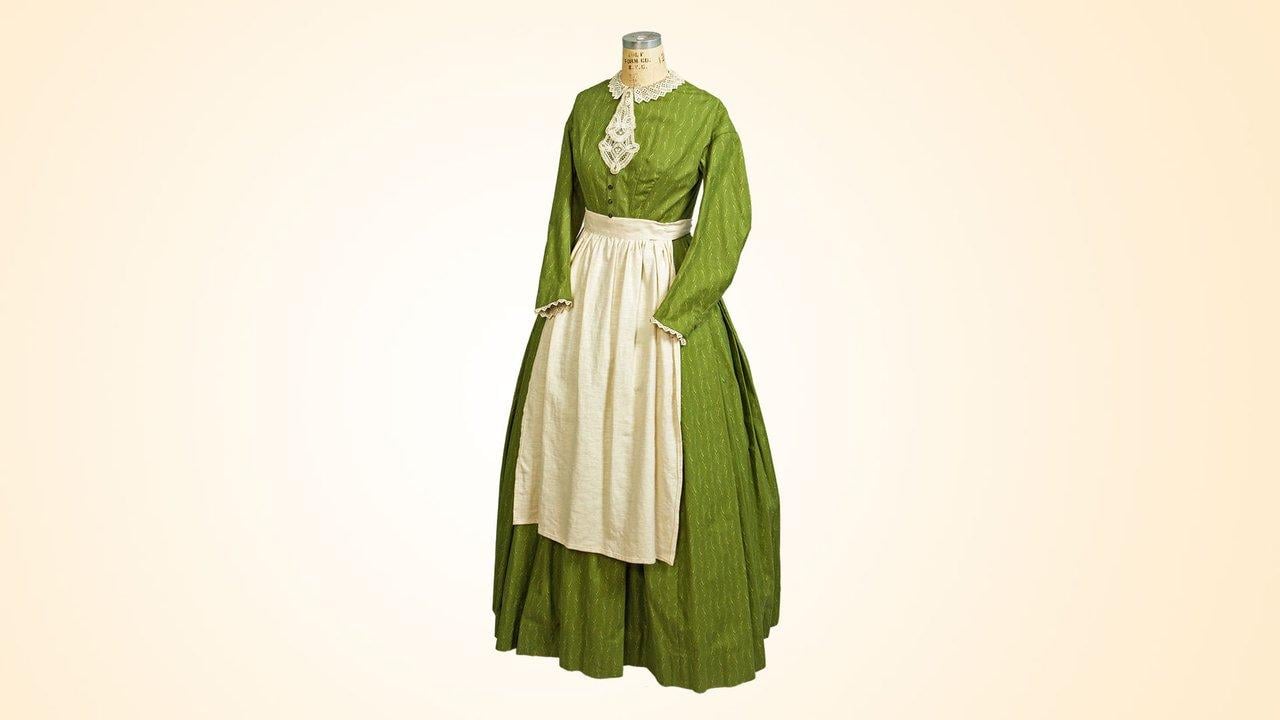 Nurse Anne Hasting's (Tara Summers) cotton dress with linen apron. (PBS, Sketches courtesy Amy Andrews Harrell)