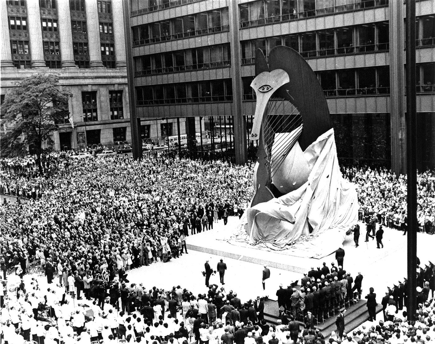 The unveiling of the Chicago Picasso, with a large crowd around the sculpture