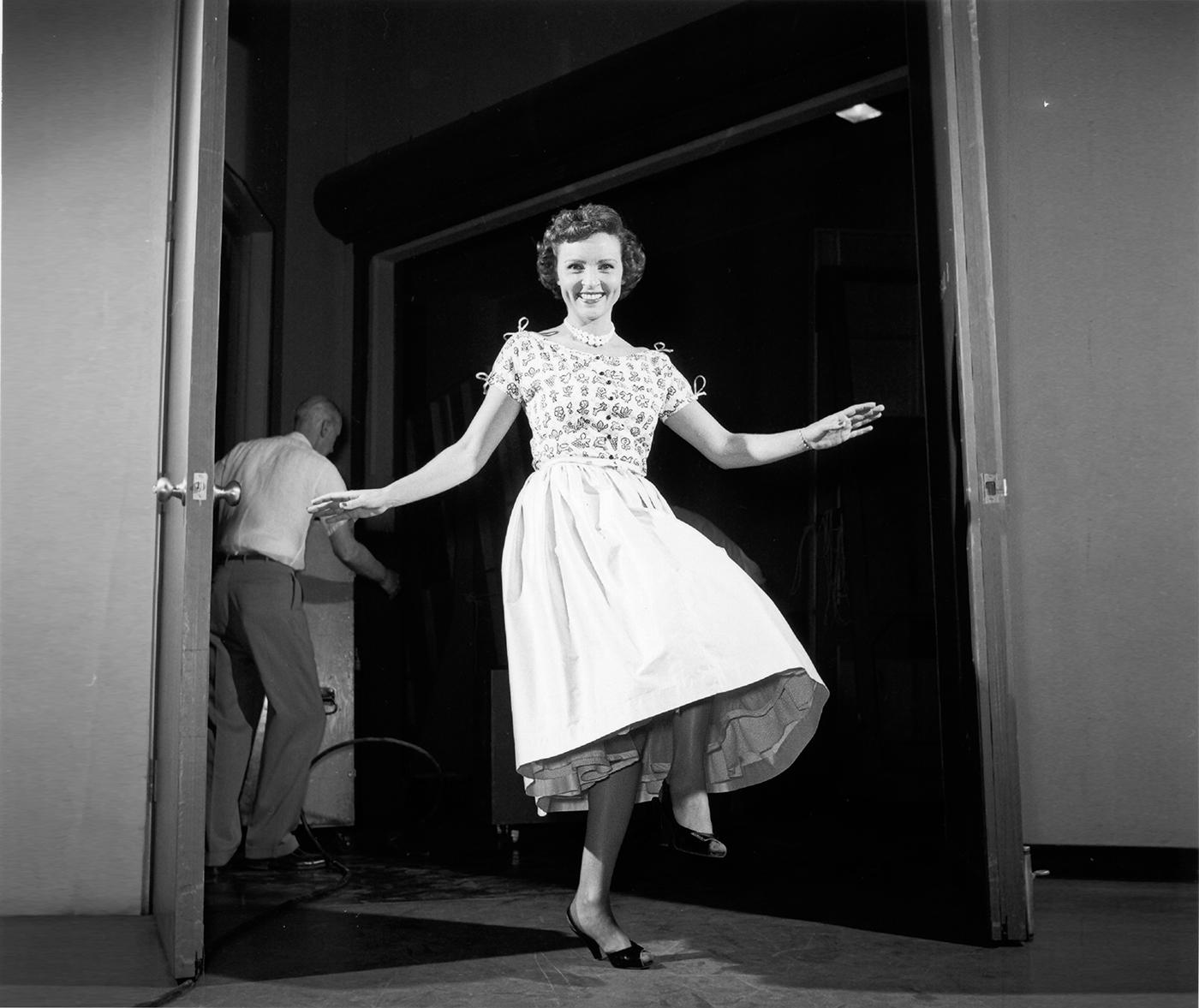 Betty White enjoying an off-camera moment on an early version of “The Betty White Show.” Photo: Pioneers of Television Archives