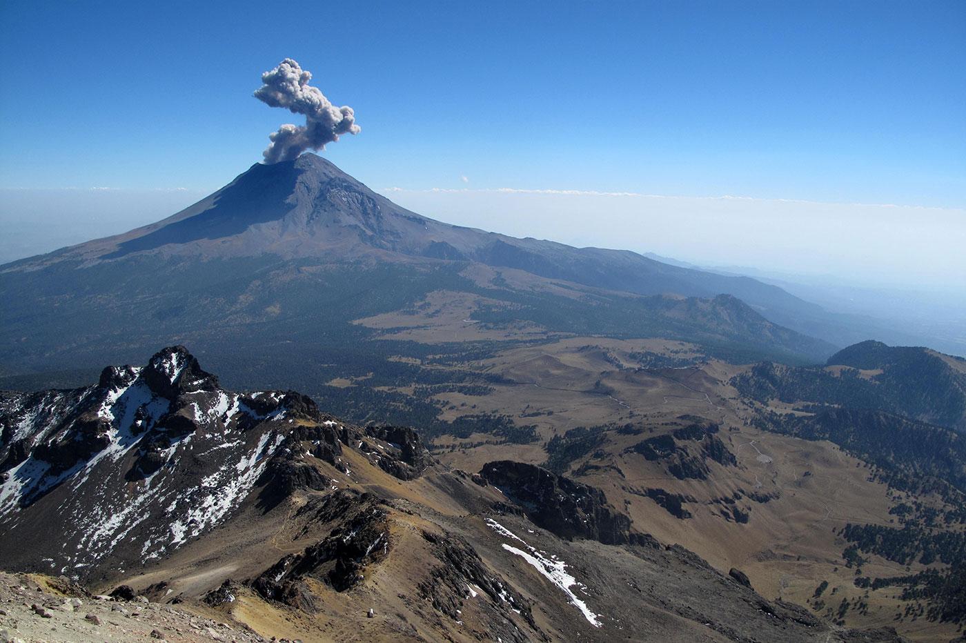 Popocatépetl is Mexico's most active volcano and lies on the outskirts of its largest metropolis, Mexico City. Photo: Martin Schneiter/Alamy Stock Photo 2015