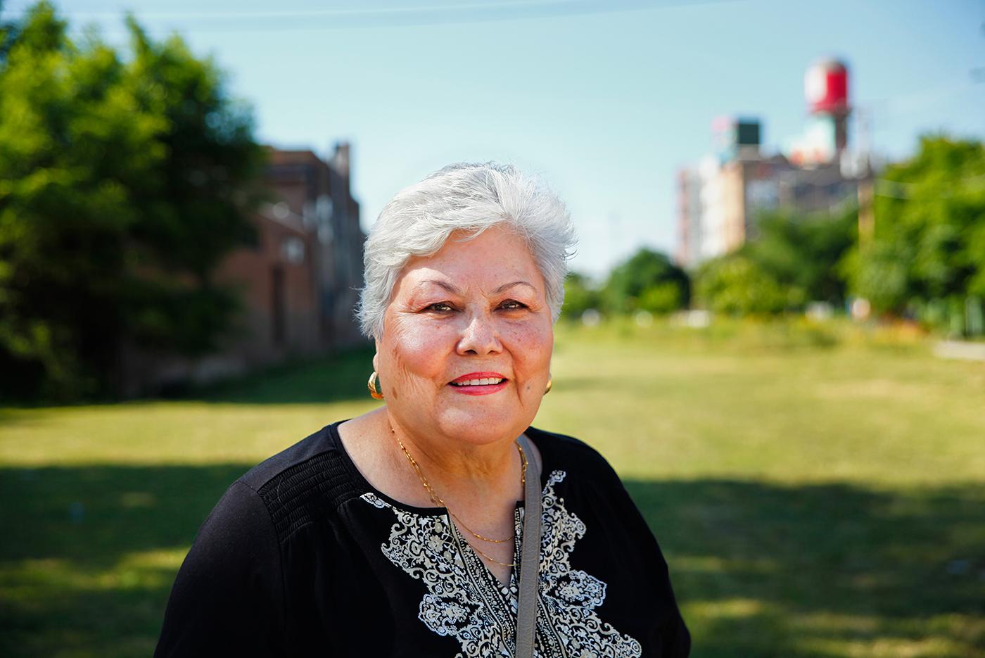 Longtime community activist Teresa Fraga stands near the site where crews could soon begin building a proposed “rails to trails” path from Pilsen to South Lawndale.