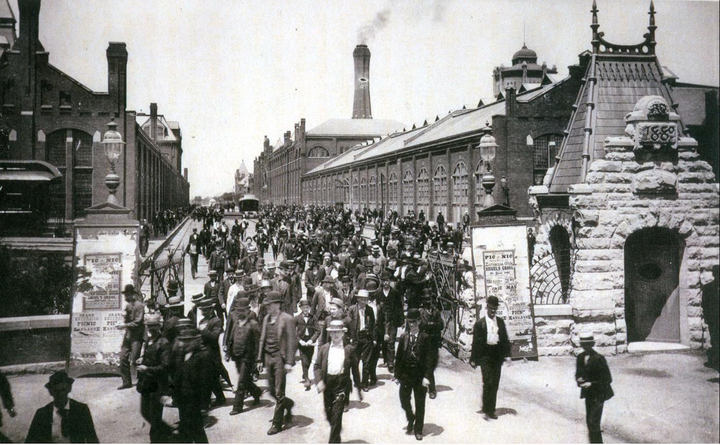 Workers leave the Pullman Palace Car Works, 1893. This picture appeared in a promotional booklet celebrating the labor policies of George Pullman.