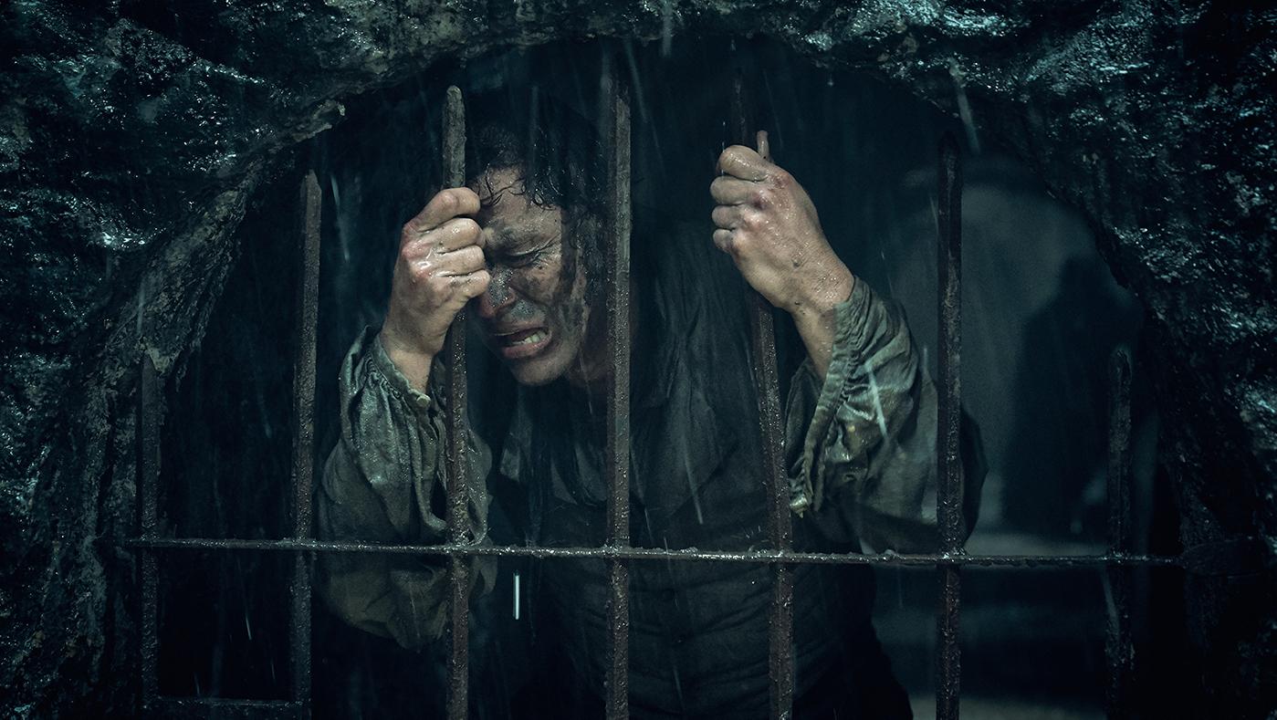 Jean Valjean (Dominic West) in the sewer in Les Miserables. Photo: Robert Viglasky / Lookout Point