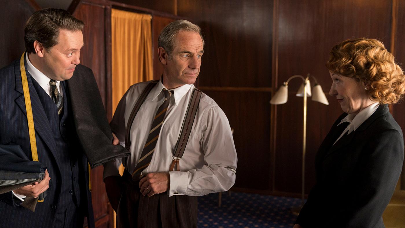 Geordie getting a new suit with Cathy in Grantchester. Photo: Kudos and MASTERPIECE