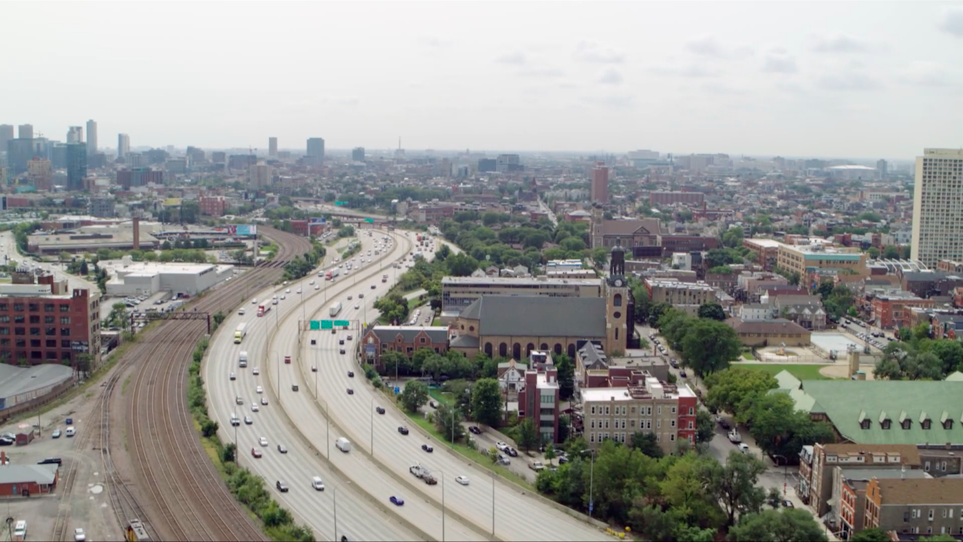 The Kennedy Expressway curving around St. Stanislaus Kostka in Chicago. Image: WTTW