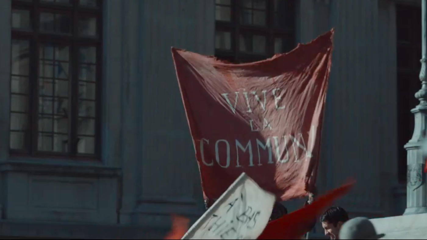A pro-Commune banner in Around the World in 80 Days. Image: Masterpiece