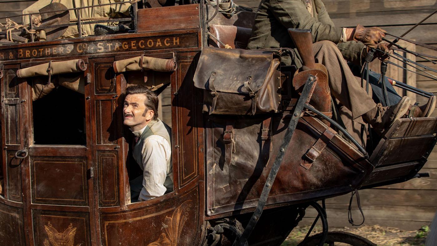 Phileas Fogg in a stagecoach in Around the World in 80 Days. Photo: Tudor Cucu - © Slim 80 Days / Federation Entertainment / Peu Communications / ZDF / Be-Films / RTBF (télévision belge)