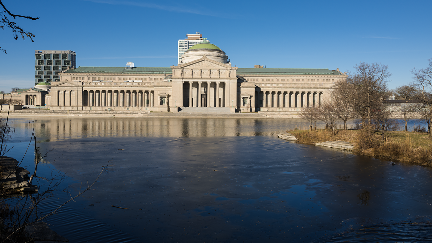 The Museum of Science and Industry in Chicago seen across a lagoon