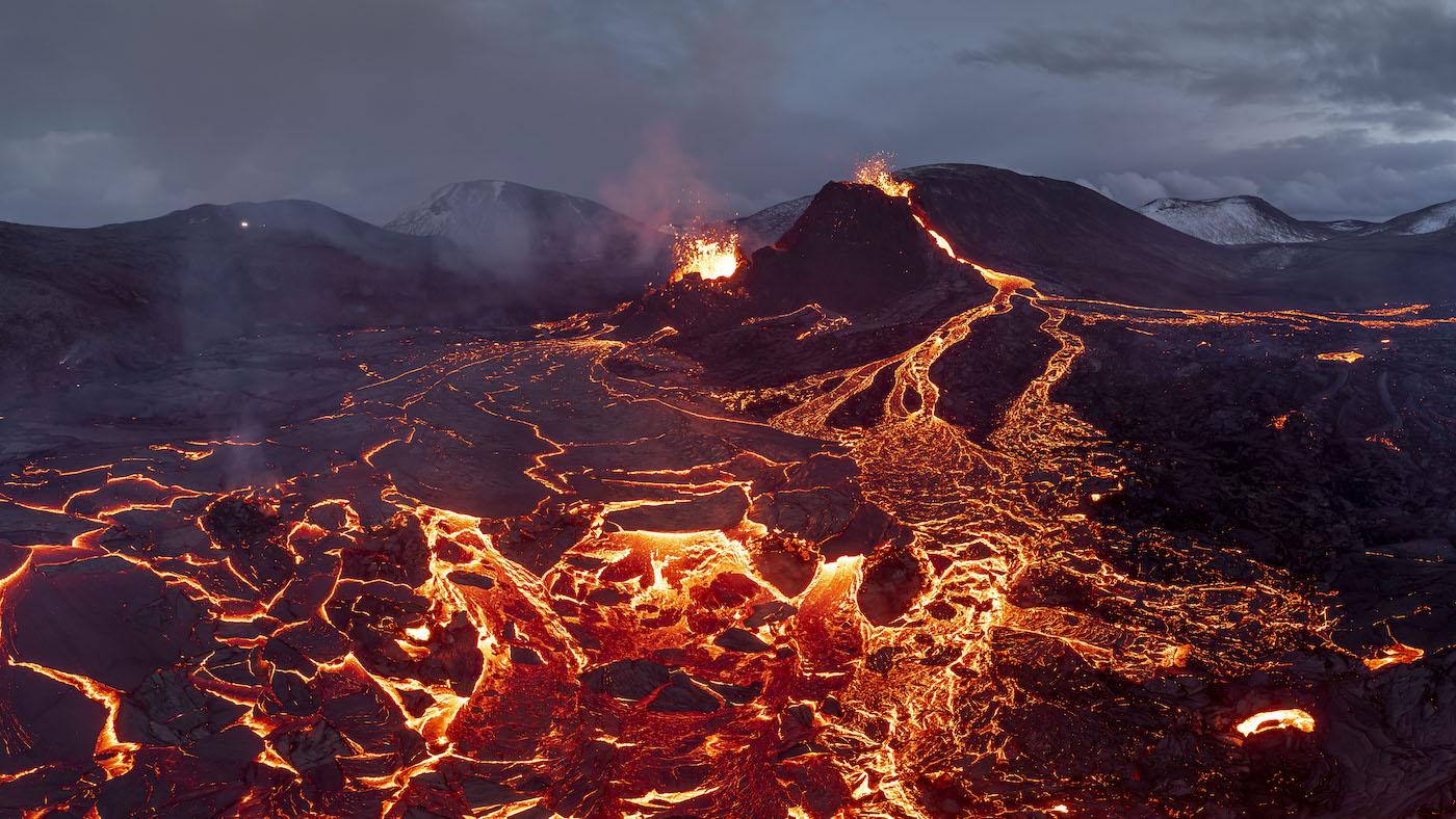 On Iceland’s Reykjanes Peninsular, Fagradalsfjall Volcano spews molten lava across the valley