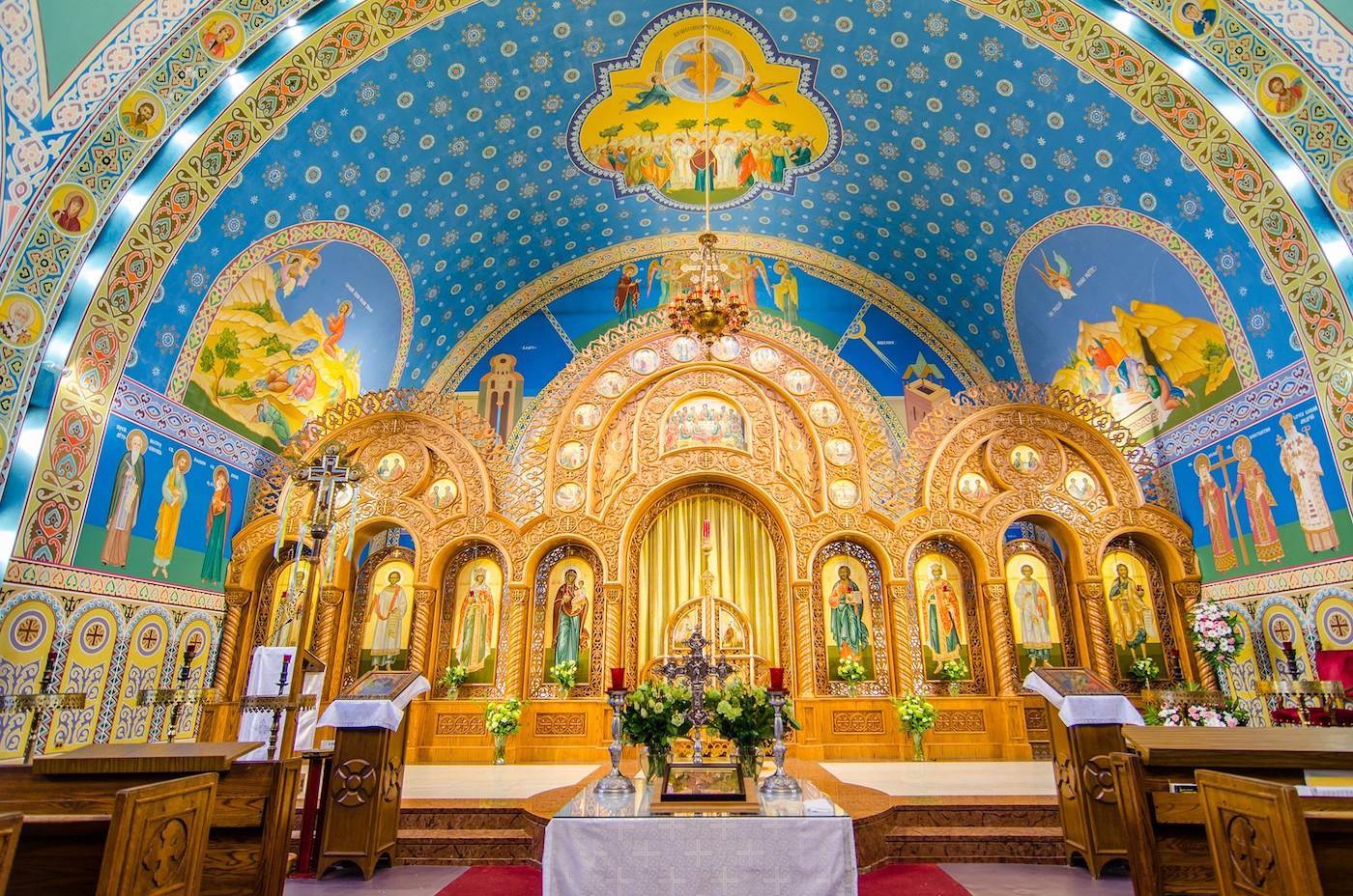 The blue and gold, highly ornamented altar of Sts. Volodymyr and Olha in Chicago