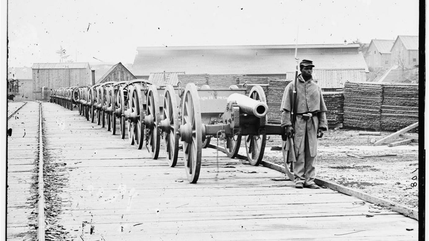 Unidentified Black Soldier with Cannons. (Library of Congress)